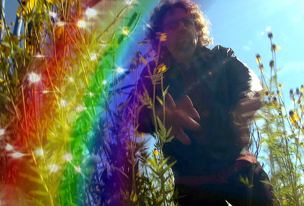 Rainbow over documentary director Joel Gilbert